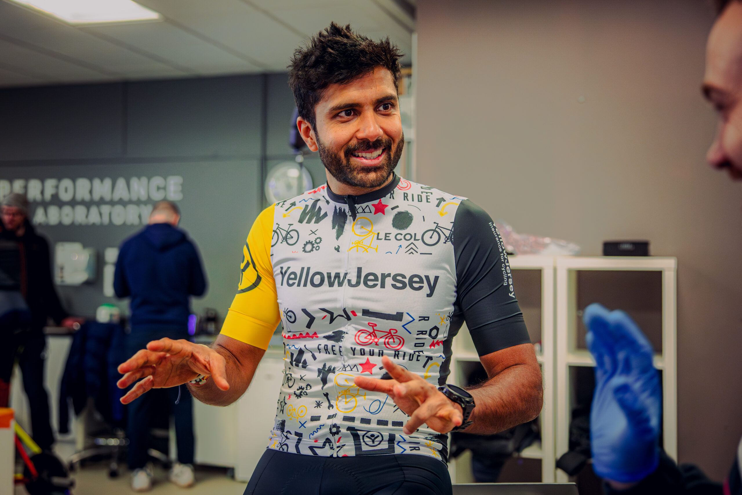 BTF x YJ ambassador Tej Thaker, riding a stationary bicycle