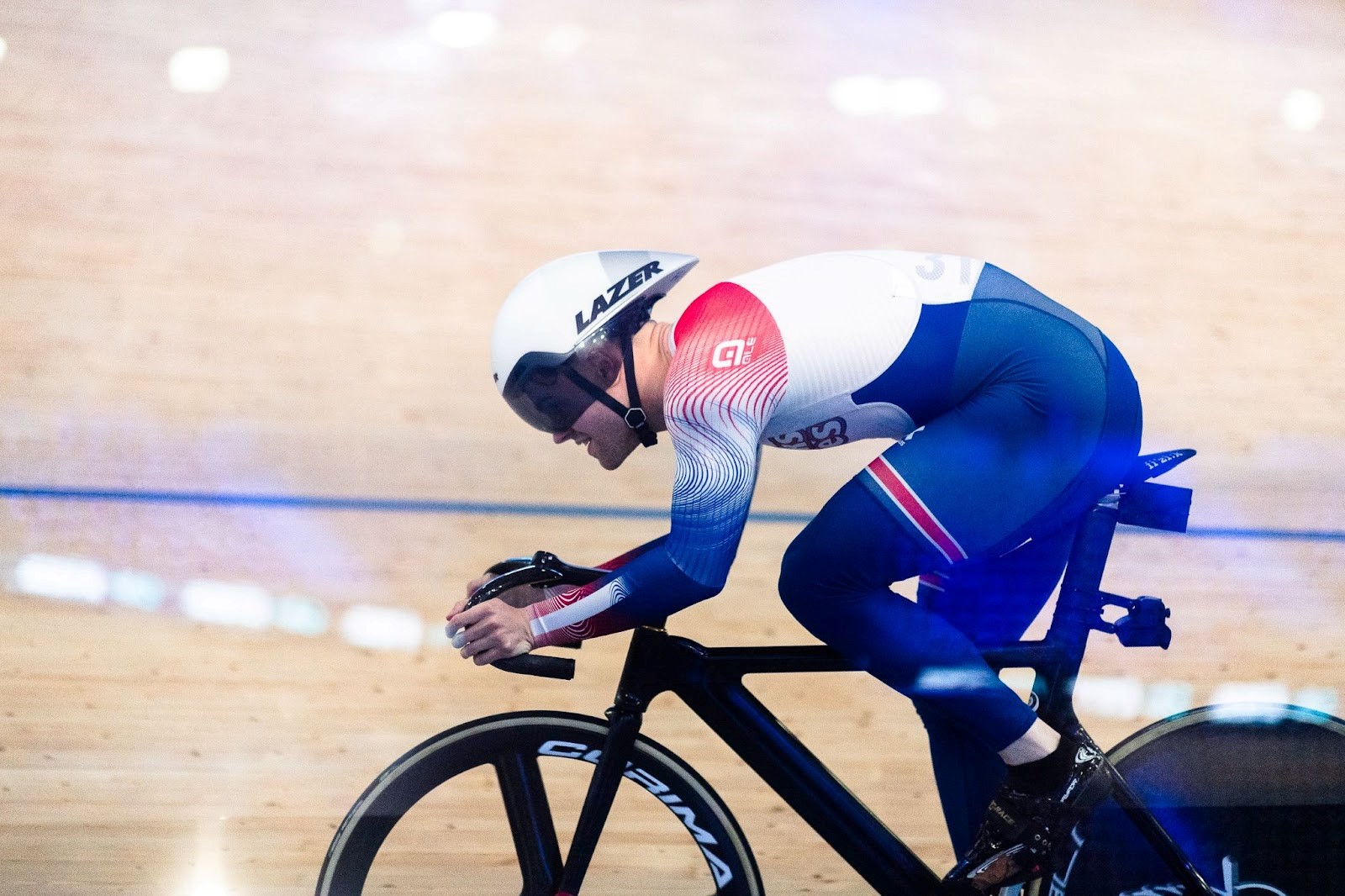 A track cyclist racing in the velodrome