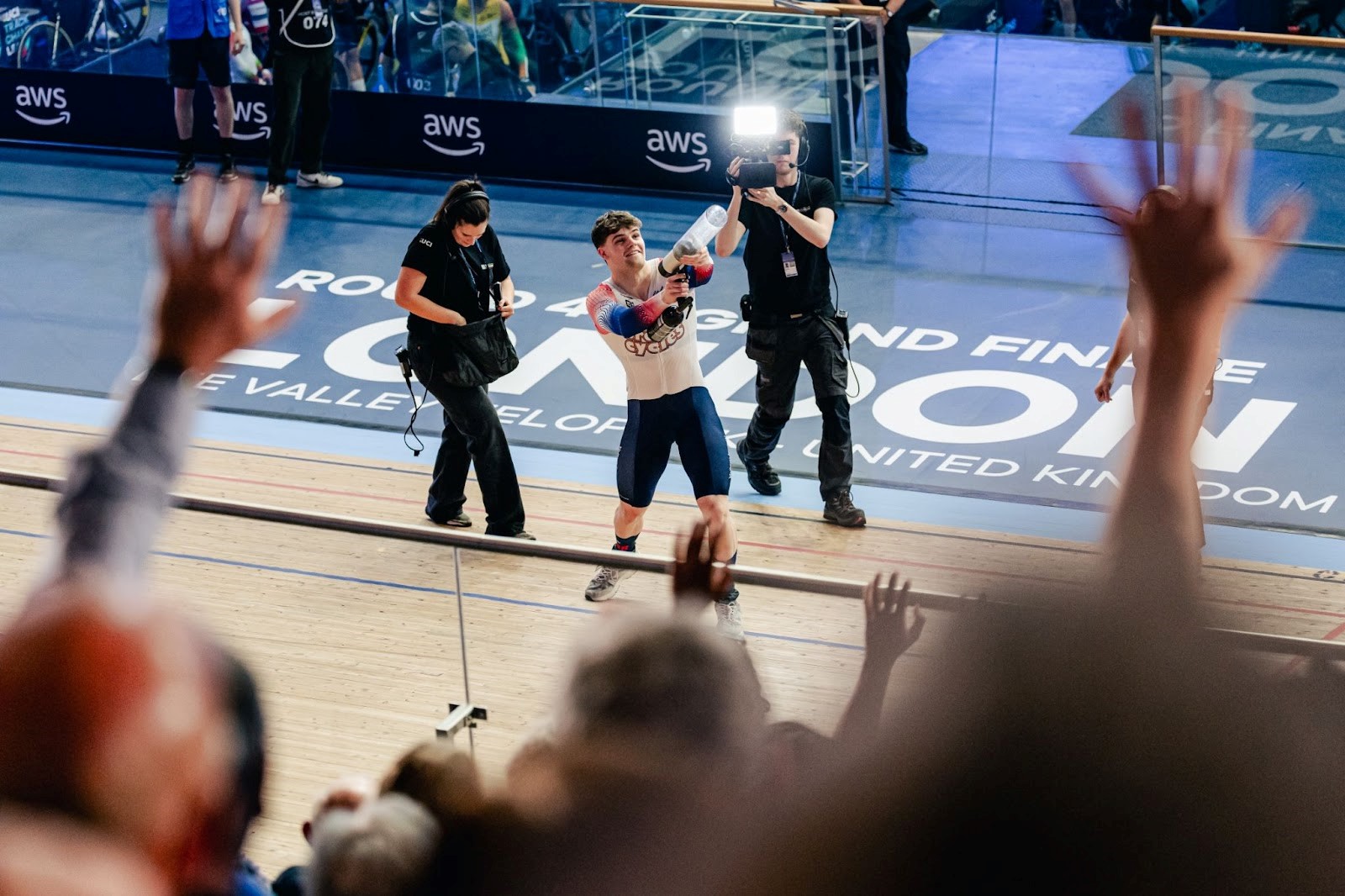 A track cyclist using a t-shirt cannon